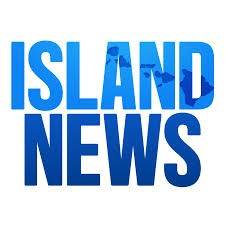 Logo with 'Island News' in bold blue letters on white background.