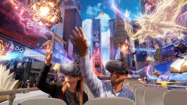 Two people with VR headsets on a bus, surrounded by virtual cityscape and magical elements.