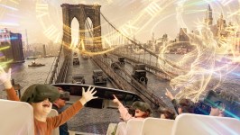 Kids in VR ride experience 3D scenes of Brooklyn Bridge and historical imagery.