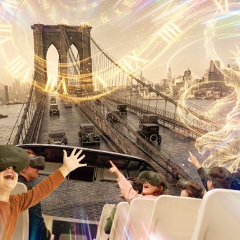 Kids in VR ride experience 3D scenes of Brooklyn Bridge and historical imagery.